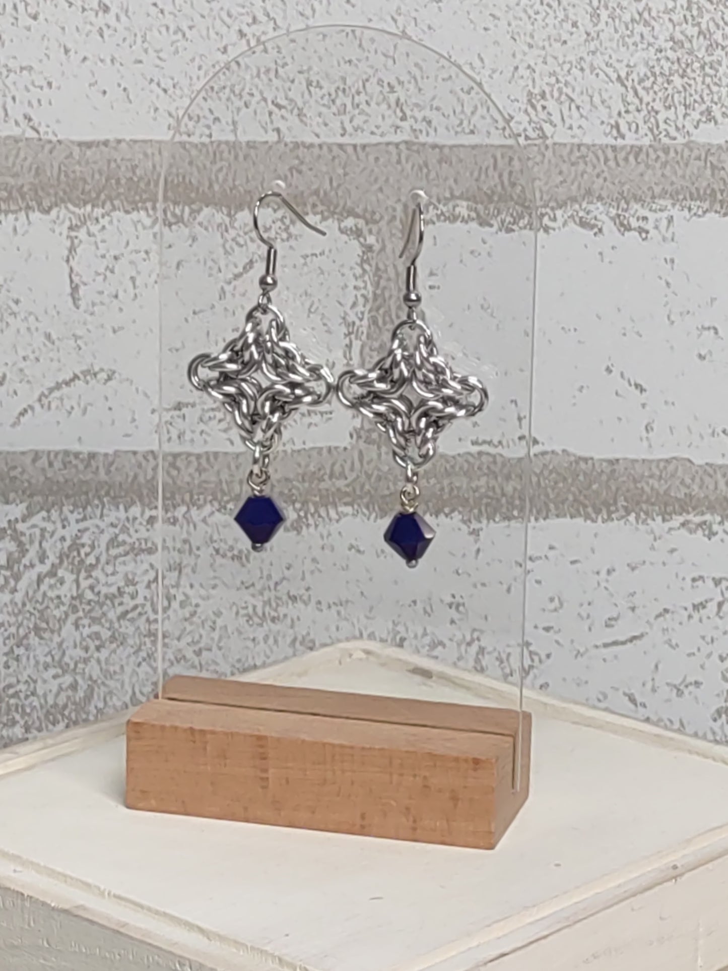 Diamond shaped byzantine chainmail earrings with a navy blue bicone drop bead - zoomed out