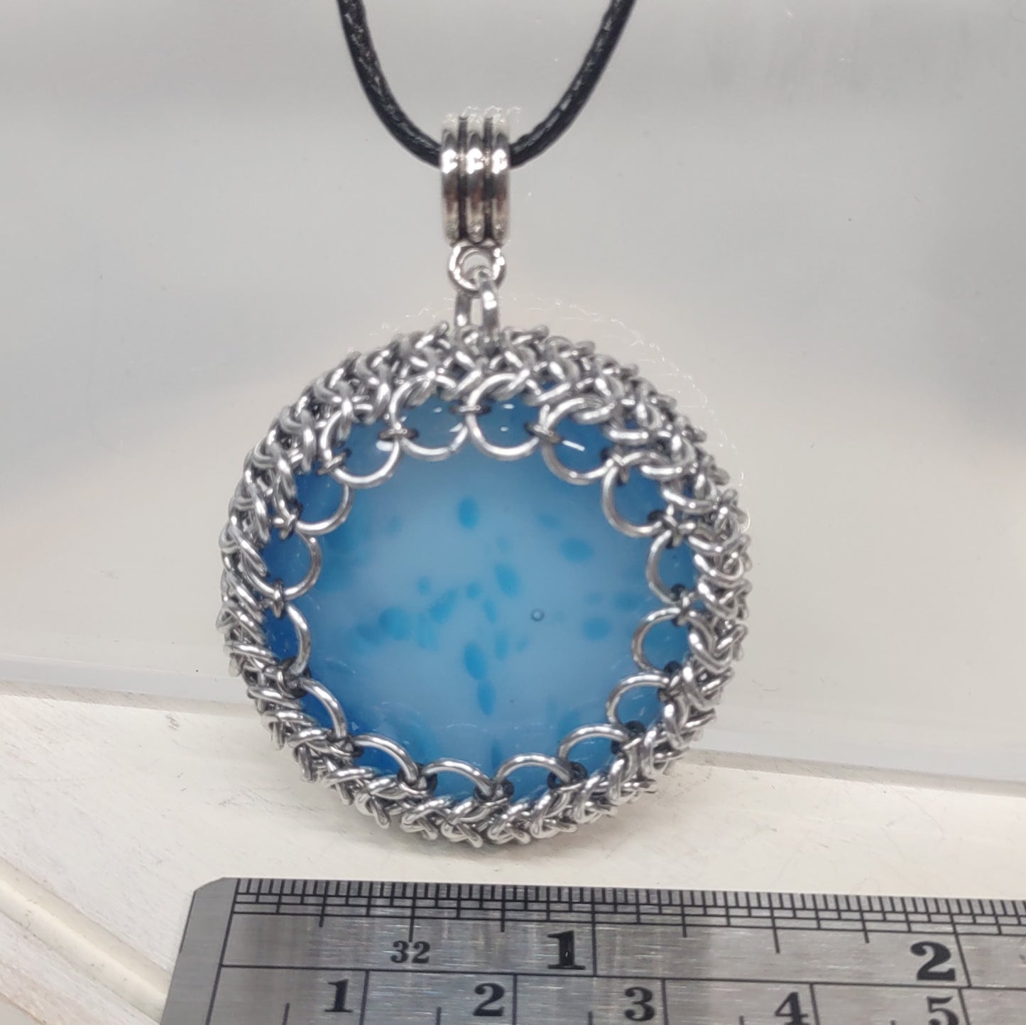 Blue Glass Cabochon wrapped in Chainmail