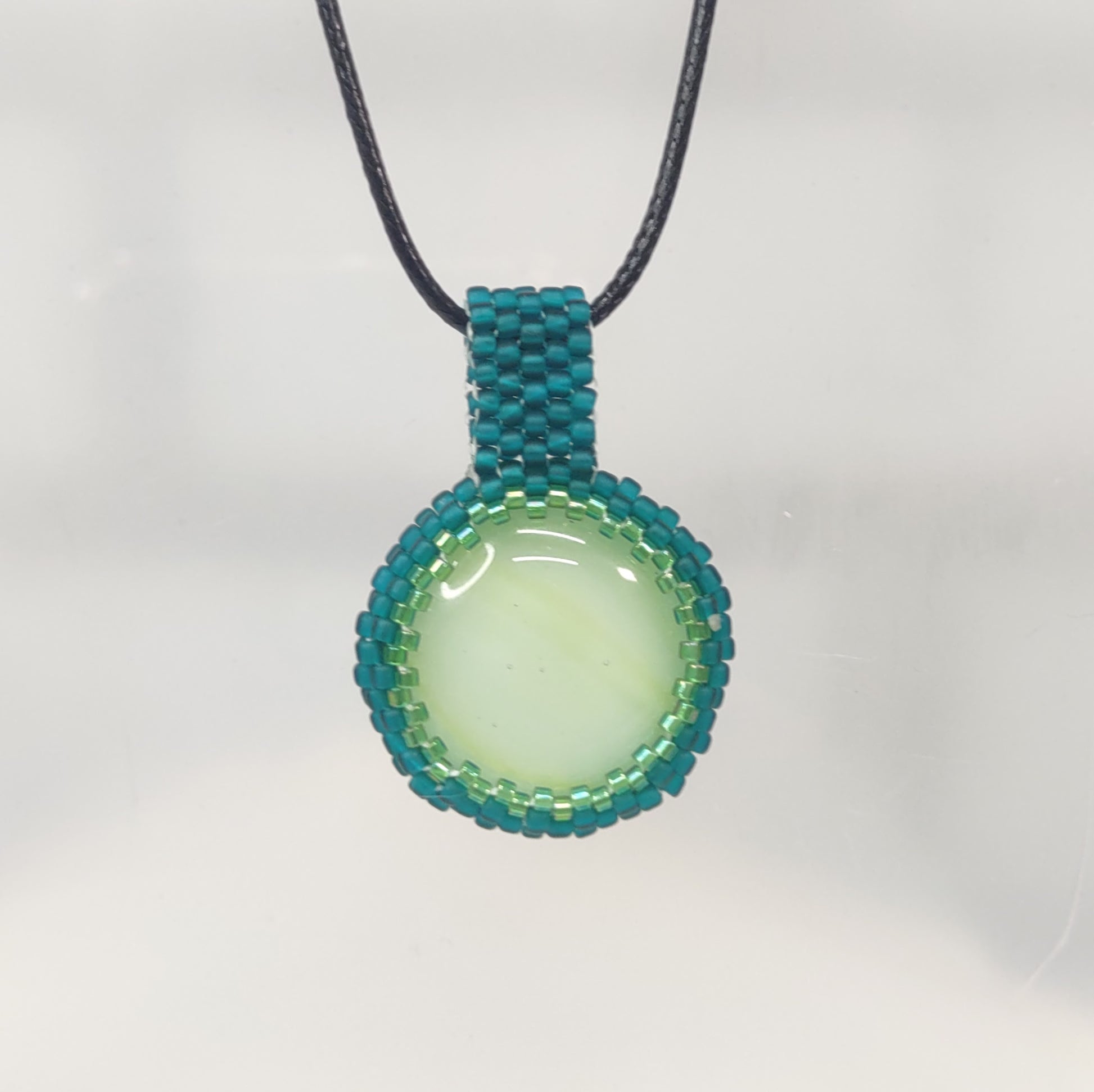 Front View Green Cab Pendant with Teal Beading